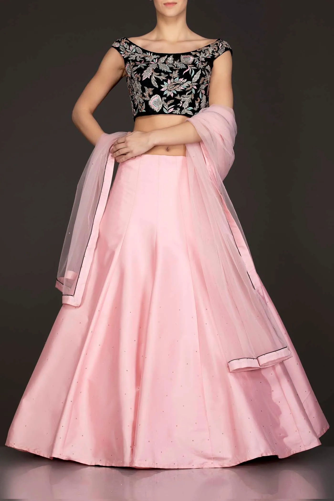 Dark Green Velvet Top With Baby Pink Silk Lehenga And Net Dupatta