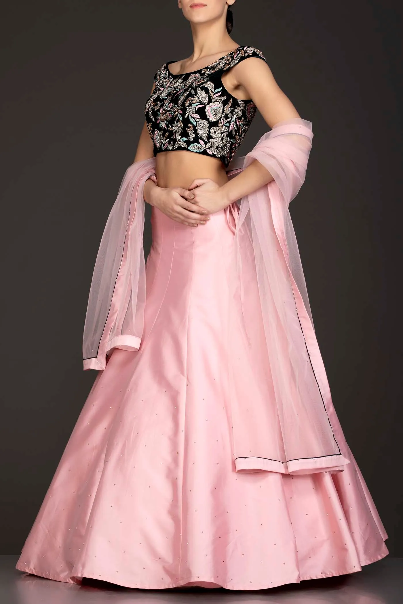 Dark Green Velvet Top With Baby Pink Silk Lehenga And Net Dupatta