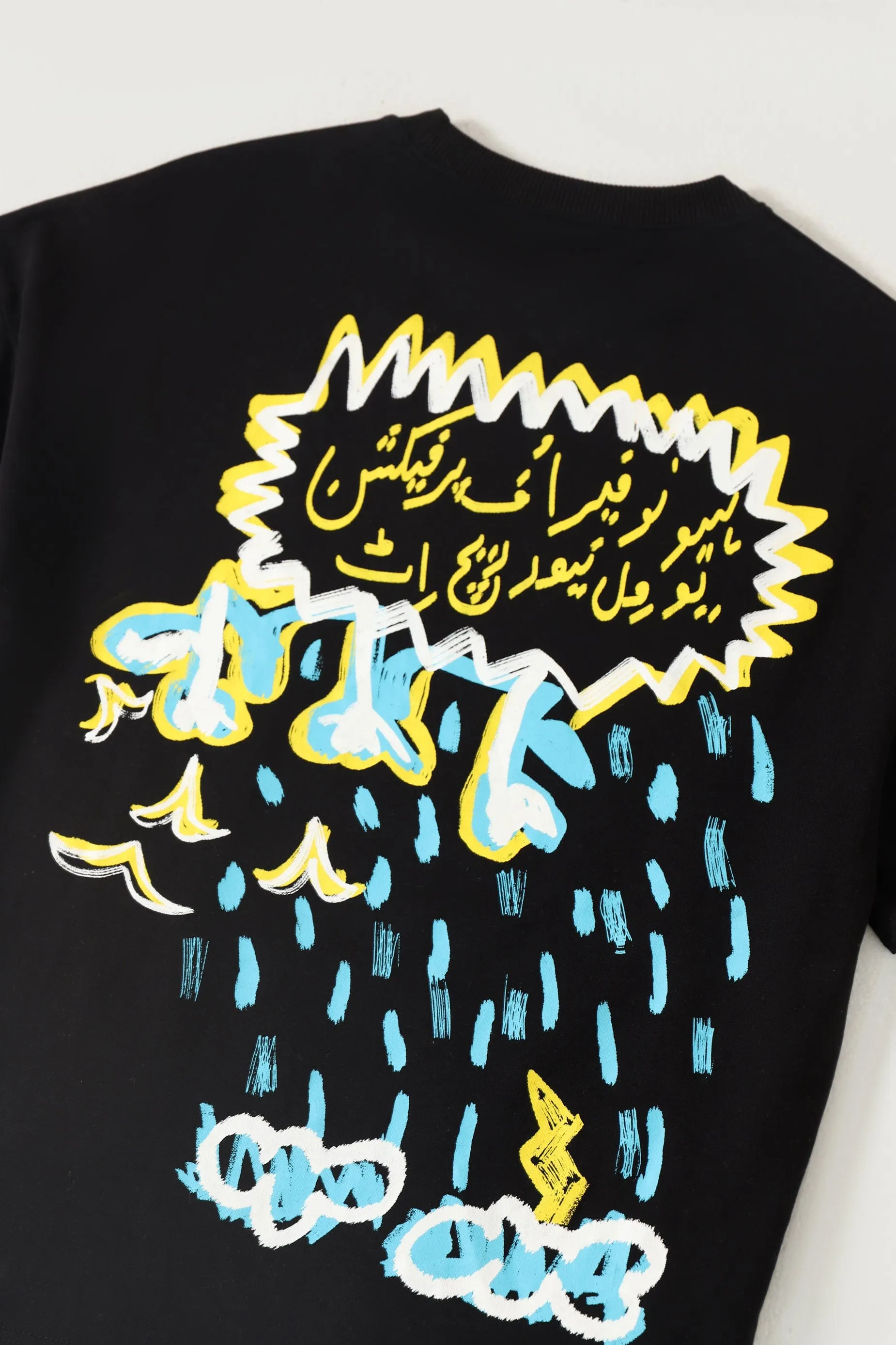 "CLOUDS ABOVE" PRINTED PATCHWORK T SHIRT